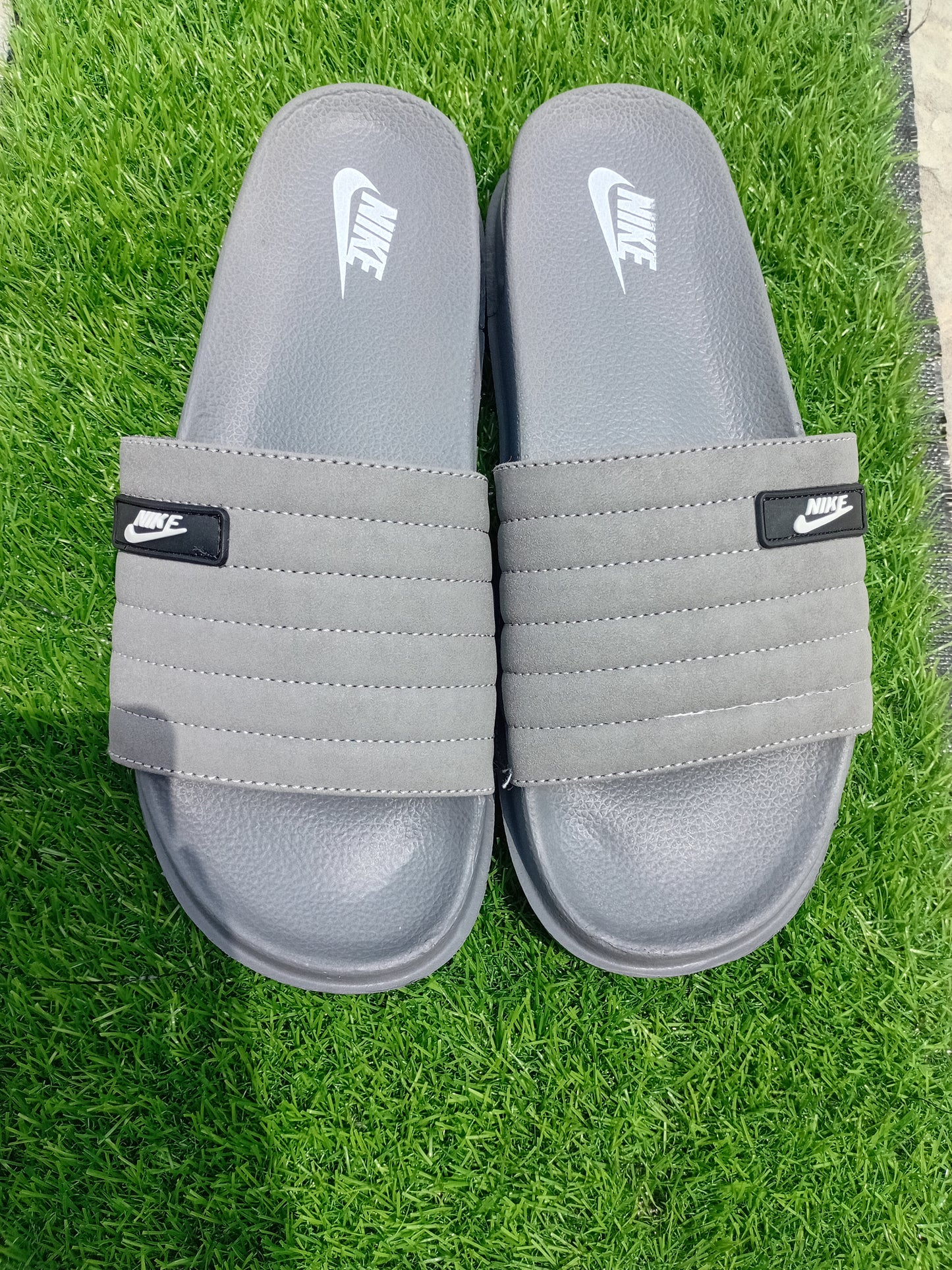 Nike — Premium Comfort Lifestyle Slides - Umer ShopNike — Premium Comfort Lifestyle SlidesUmer ShopUmer ShopNike — Premium Comfort Lifestyle SlidesGray40/7Nike — Premium Comfort Lifestyle Slides