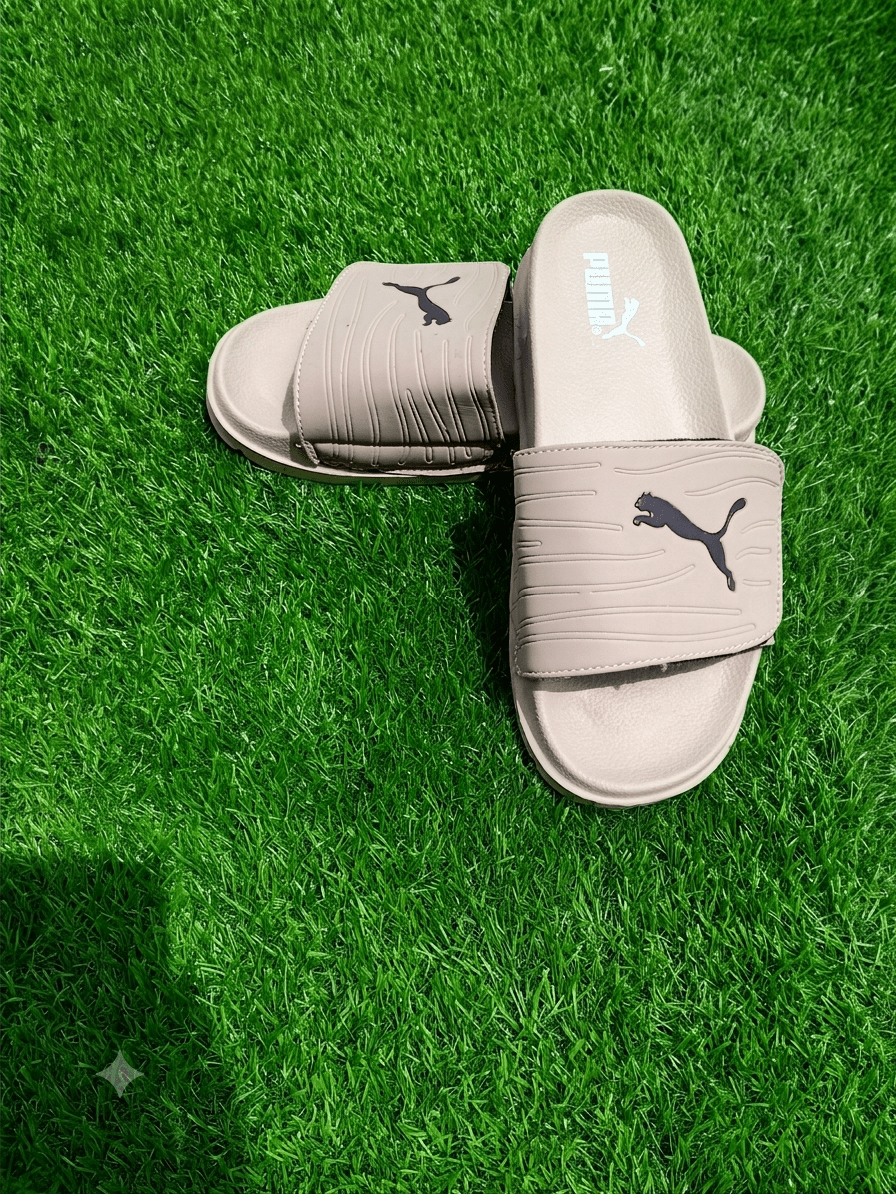 Puma — Premium Comfort Lifestyle Slides - Umer ShopPuma — Premium Comfort Lifestyle SlidesUmer ShopUmer ShopPuma — Premium Comfort Lifestyle SlidesGray40/7Puma — Premium Comfort Lifestyle Slides