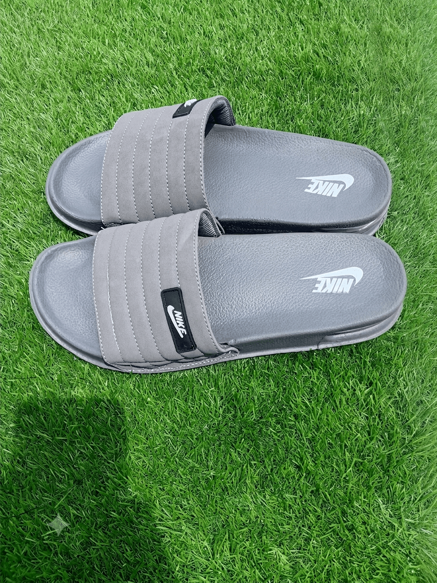 Nike — Premium Comfort Lifestyle Slides - Umer ShopNike — Premium Comfort Lifestyle SlidesUmer ShopUmer ShopNike — Premium Comfort Lifestyle SlidesGray40/7Nike — Premium Comfort Lifestyle Slides
